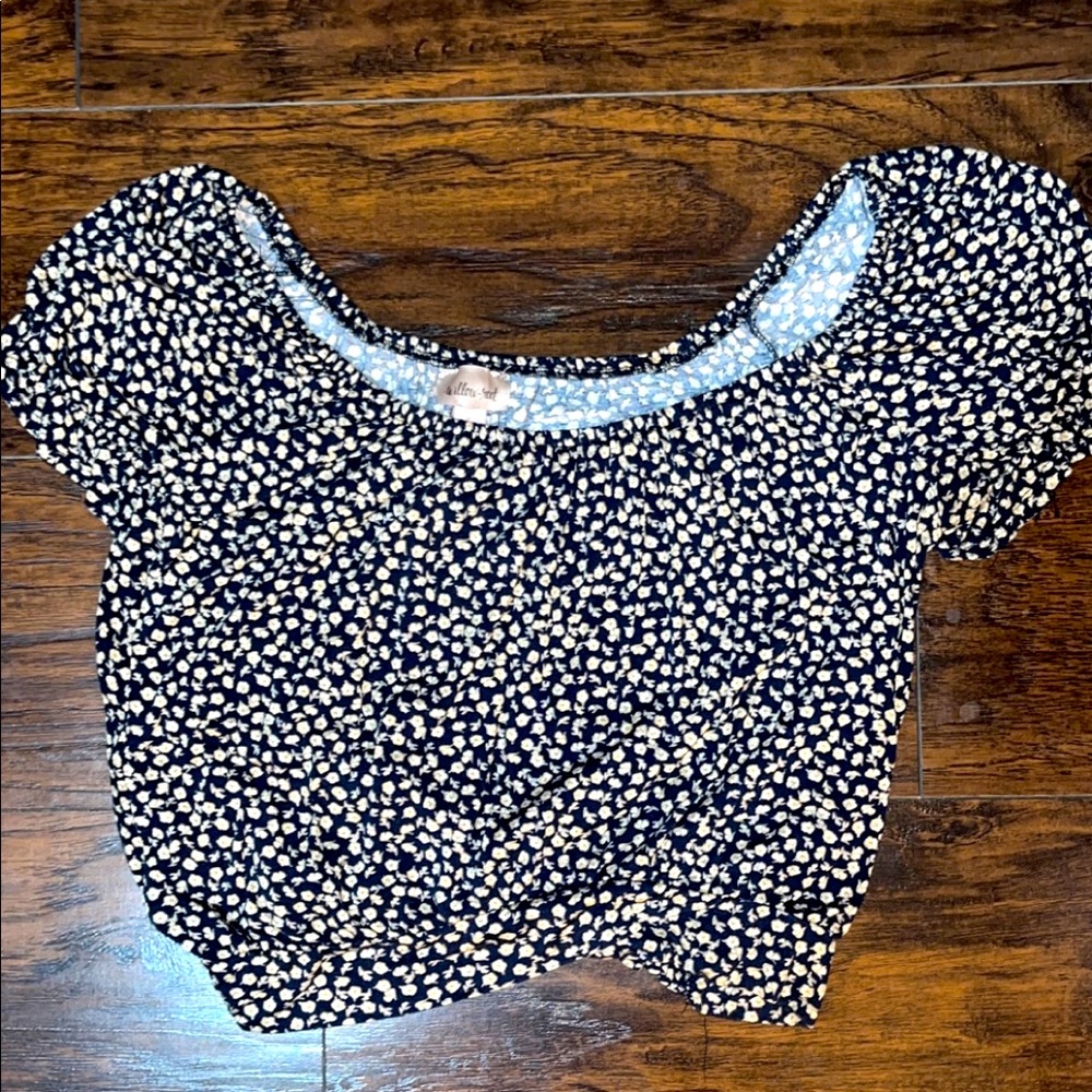 Crop/off the shoulder shirt.